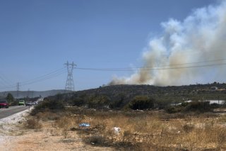 L'incendie à l'est de la station balnéaire d'Izmir avait déjà coûté la vie jeudi à un homme de 81 ans alité et à un ouvrier forestier de 39 ans (archives). KEYSTONE/AP/Cengiz Malgir